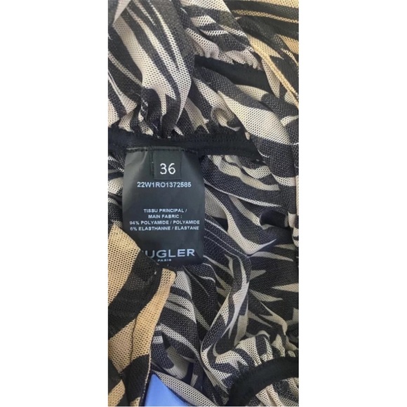 Mugler Black and Brown Swirl Star Long Sleeve Dress as worn by Khloe Kardashian - Picture 5 of 6